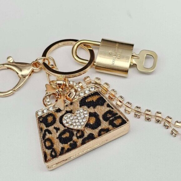 Authentic Louis Vuitton Lock & Key with unbranded Leopard Bagcharm, Keycharm - Picture 8 of 8